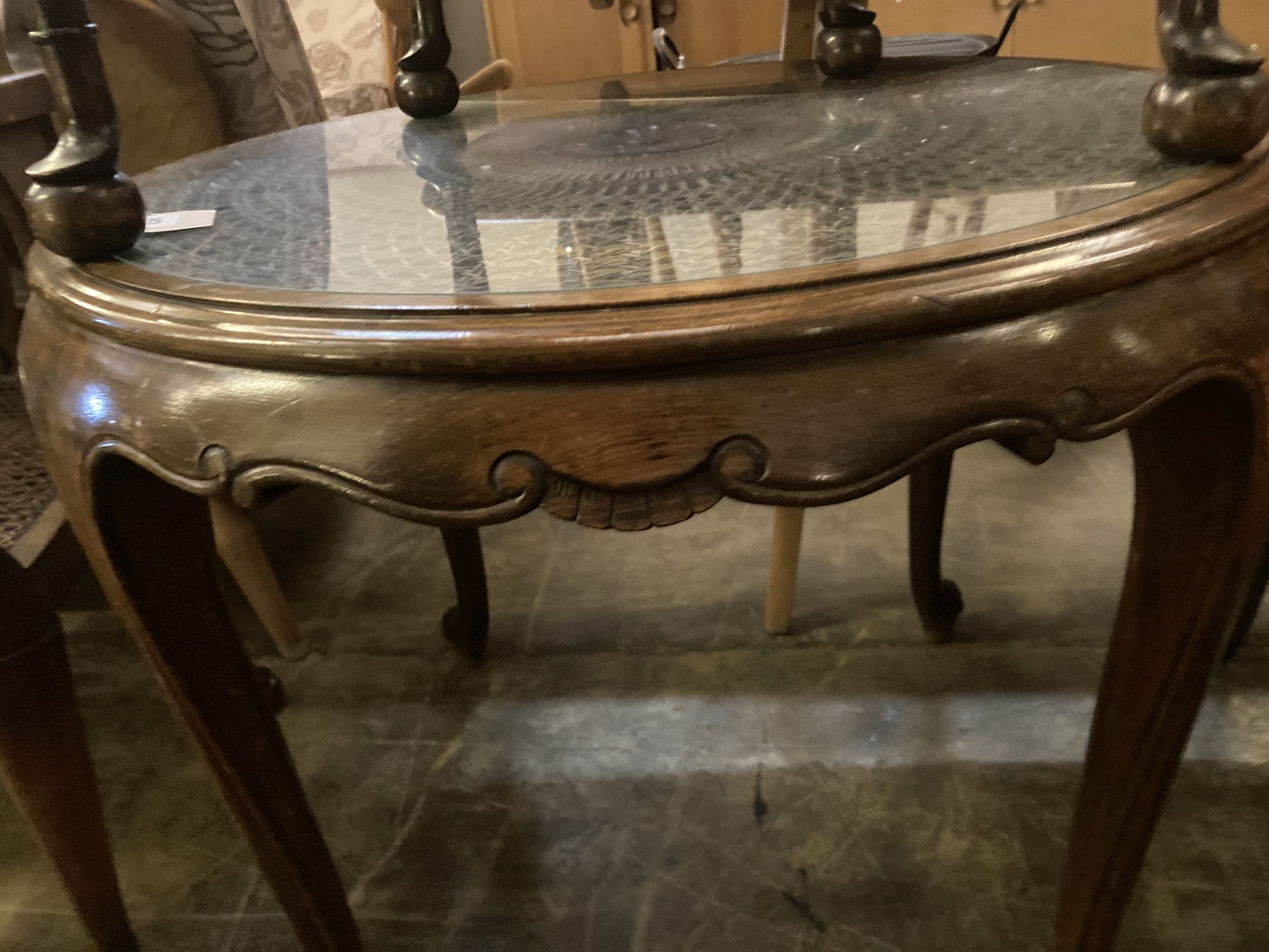 A 1920s circular caned beech occasional table, diameter 76cm, together with a pair of elbow chairs, one with a later tapestry seat